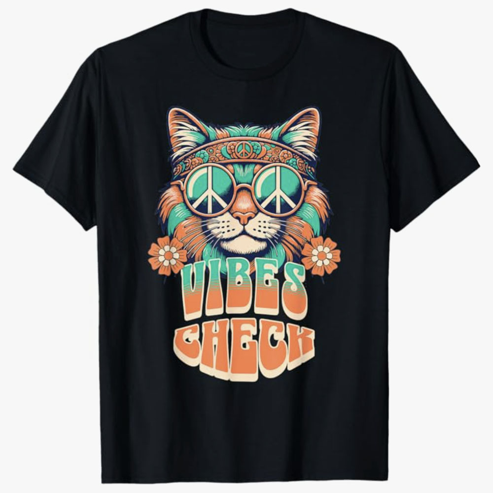 Black T-shirt featuring a colorful retro design of a hippie cat wearing peace sign sunglasses and a headband, with the phrase Vibes Check, symbolizing positivity, peace, and laid-back cool energy.