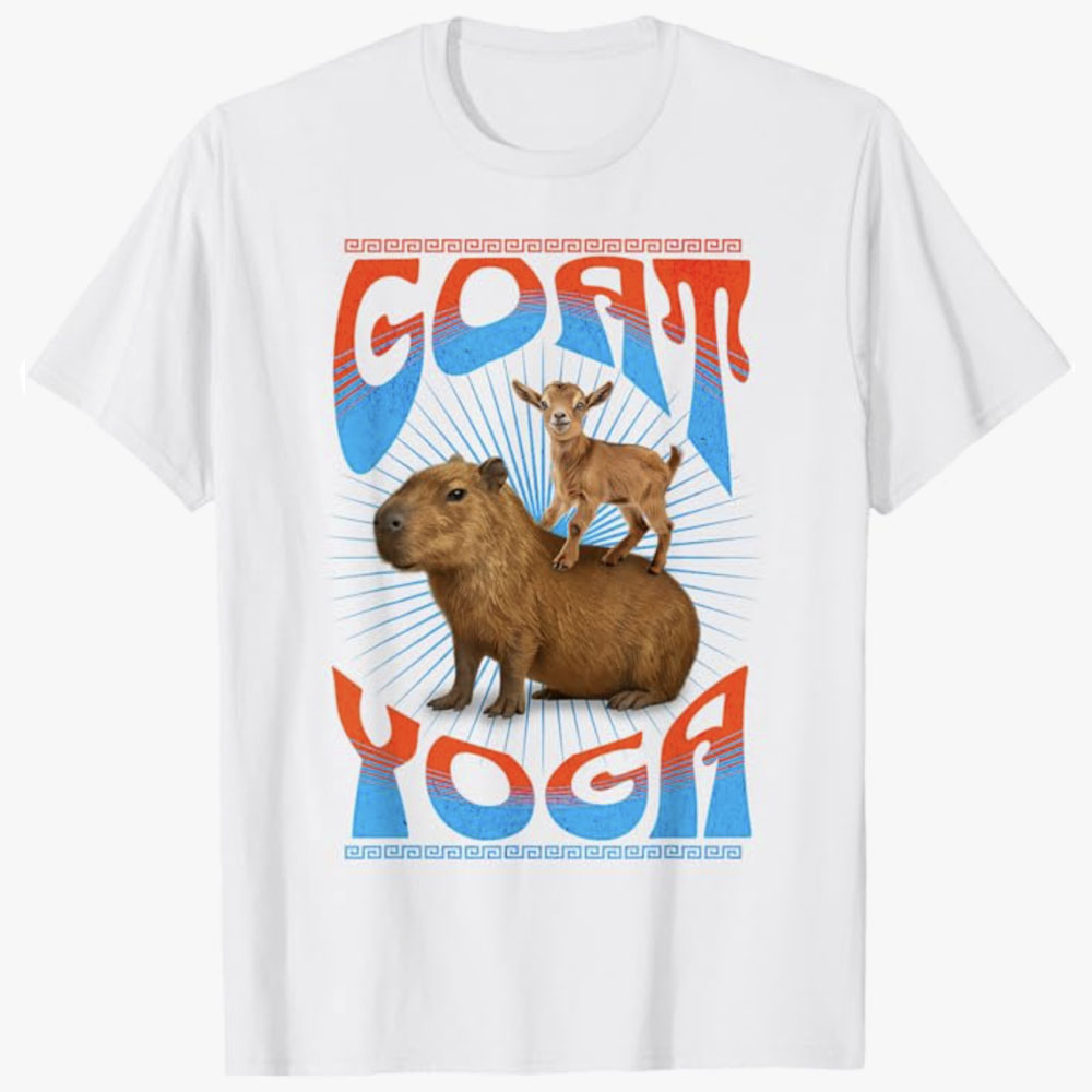  White T-shirt featuring a playful design of a baby goat standing on the back of a capybara with the words Goat Yoga in bold retro lettering, celebrating humor, relaxation, and animal-themed fun.
